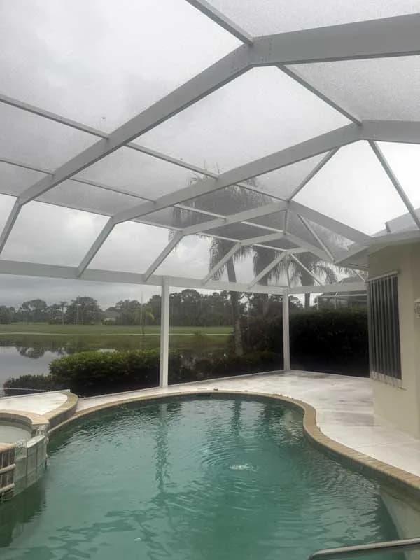 Representative screened pool enclosure and lanai at a Southwest Florida home