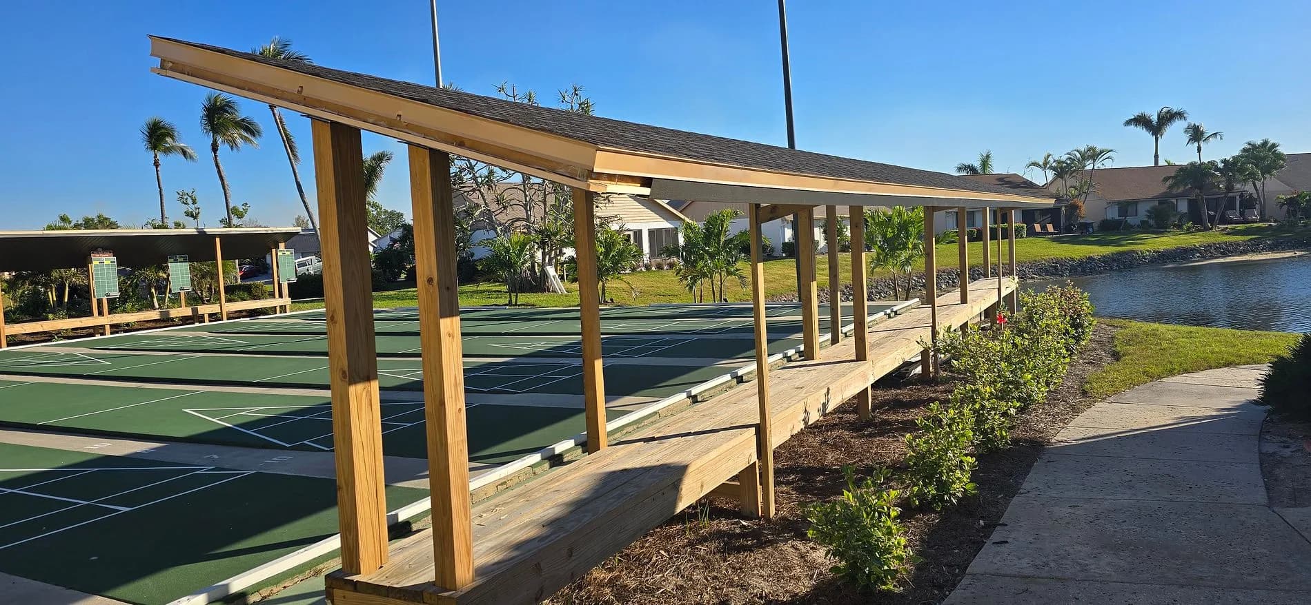 Covered seating structure during the Cinnamon Cove shuffleboard project